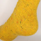 Socken 2026 - Juli: Fixe Quicky Ferse "Pusteblume" mit Lochmuster, 4-fach, Toe Up