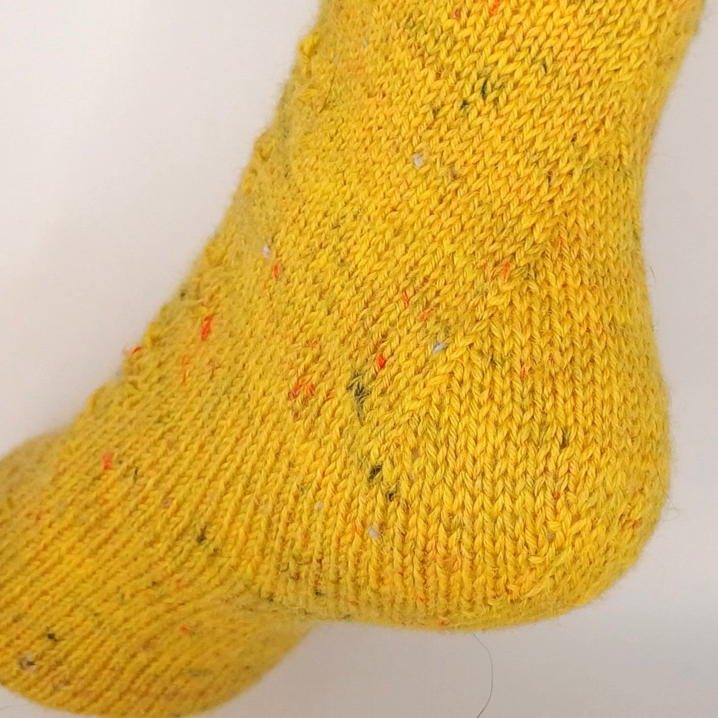Socken 2026 - Juli: Fixe Quicky Ferse "Pusteblume" mit Lochmuster, 4-fach, Toe Up