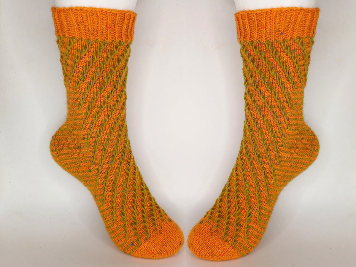 Socken 2026 - Oktober: Fixe Quicky Ferse "Fuchspfad" mit Hebemaschen, 4-fach, Toe Up